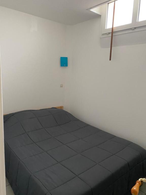 Postel nebo postele na pokoji v ubytování Gite aux grès des vents