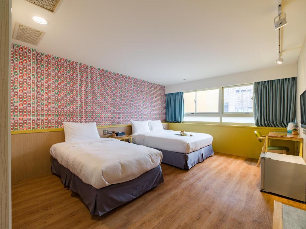 Postel nebo postele na pokoji v ubytování LaVita Hotel
