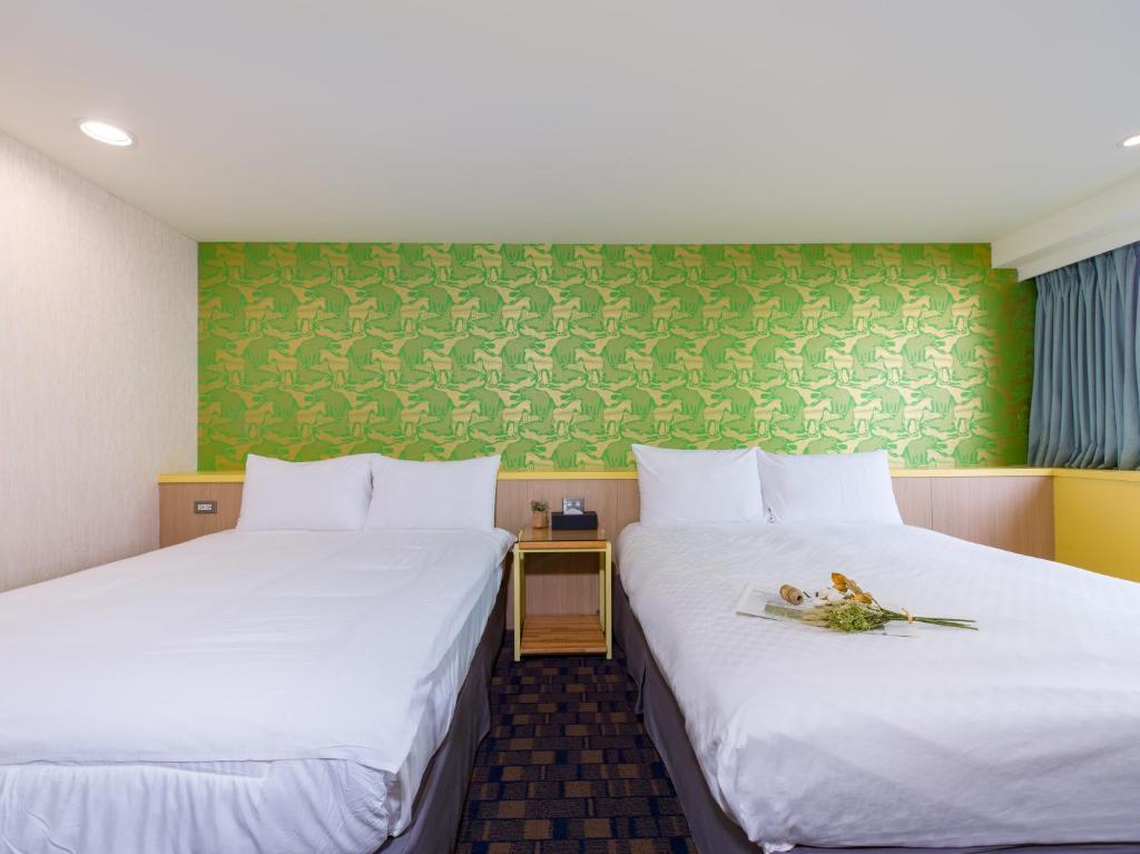 Postel nebo postele na pokoji v ubytování LaVita Hotel
