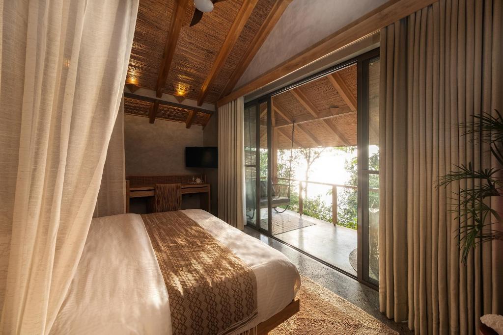 Voodi või voodid majutusasutuse Manami Resort toas