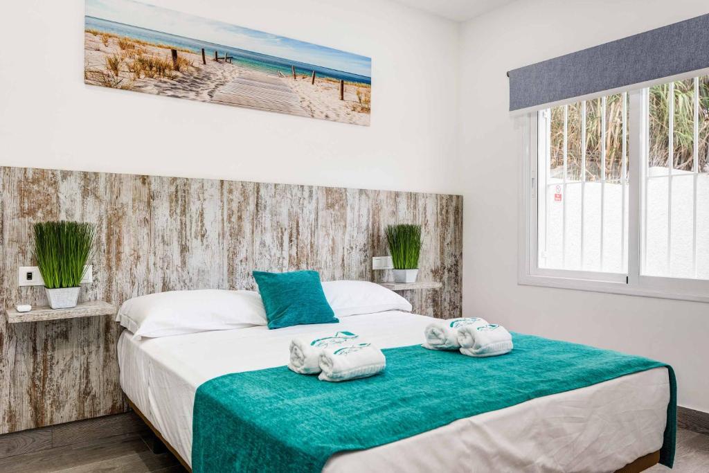 Postel nebo postele na pokoji v ubytování Villa Conchita Torremolinos