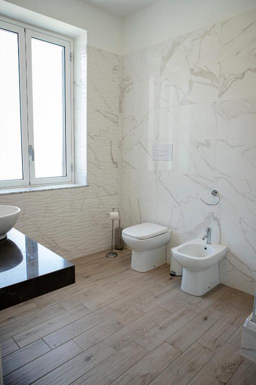 Koupelna v ubytování Esseneto Rooms