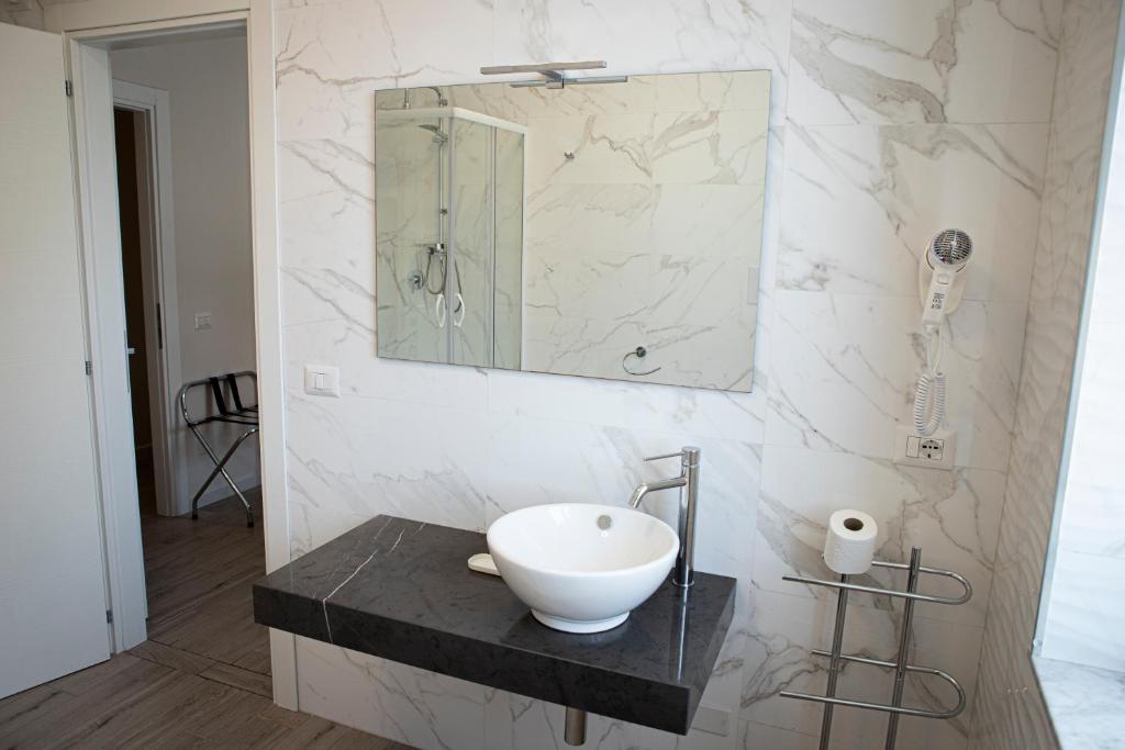 Koupelna v ubytování Esseneto Rooms