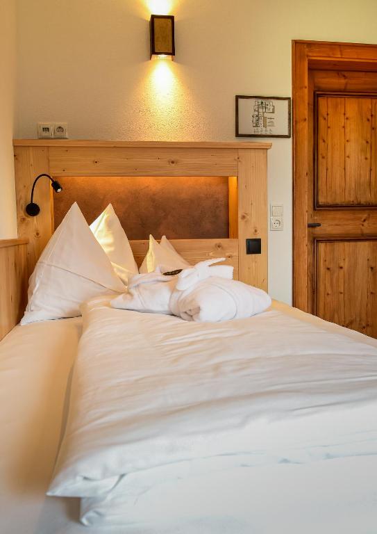 Postel nebo postele na pokoji v ubytování Hotel Spielmann