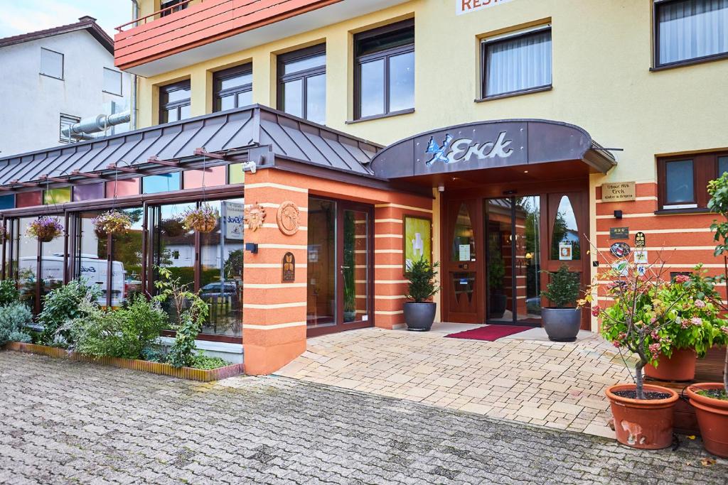 a store with a sign on the front of a building at ERCK- Flair Hotel & Restaurant in Bad Schonborn