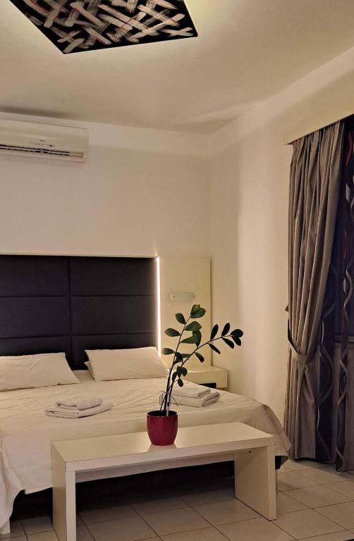 Postel nebo postele na pokoji v ubytování Bicorna - Chania