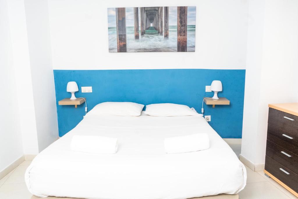 Postel nebo postele na pokoji v ubytování Apartamentos Turísticos Centro Histórico, by CartagenaSpain