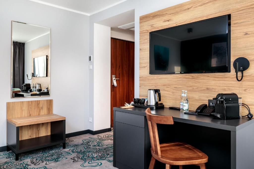 Kuchyň nebo kuchyňský kout v ubytování Hotel Kyriad Stargard