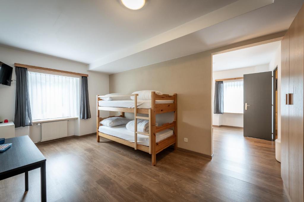 Postel nebo postele na pokoji v ubytování Hotel Greina