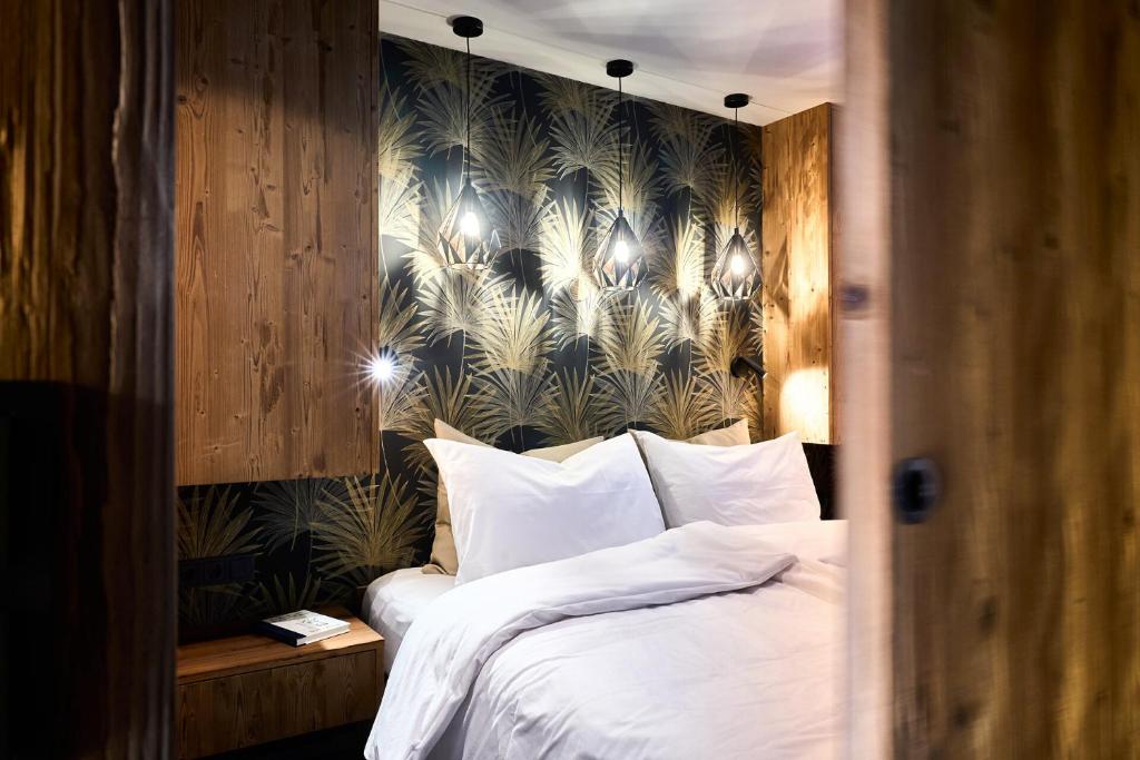 Postel nebo postele na pokoji v ubytování Aparthotel Chalina