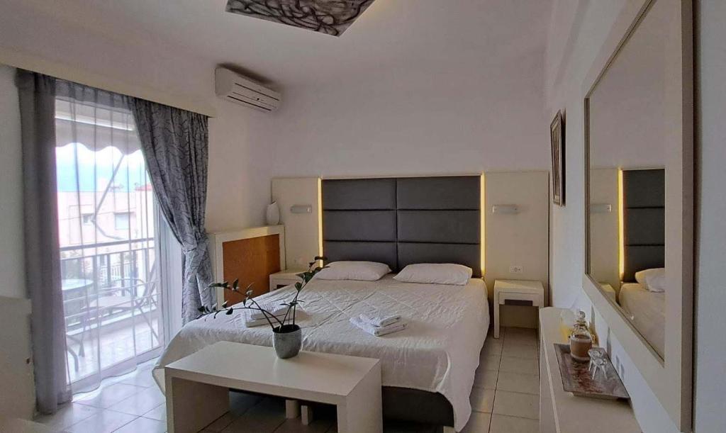 Postel nebo postele na pokoji v ubytování Bicorna - Chania