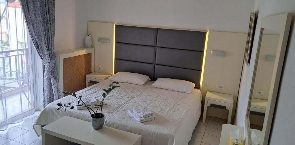 Postel nebo postele na pokoji v ubytování Bicorna - Chania