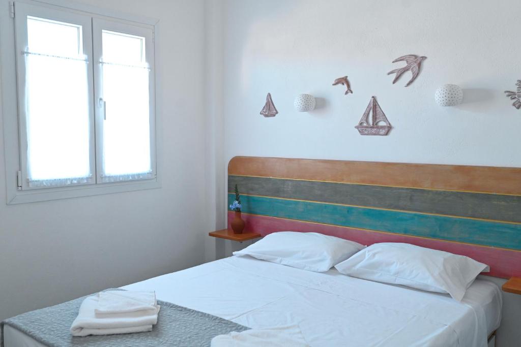 Posteľ alebo postele v izbe v ubytovaní Dolce Vista - Sea View Apartments