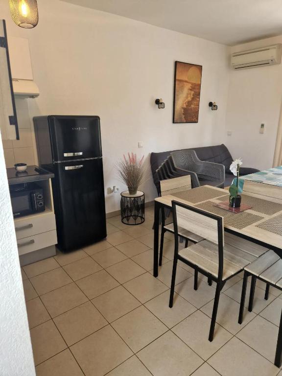 Kuchyňa alebo kuchynka v ubytovaní Appartement Poggio Mezzana
