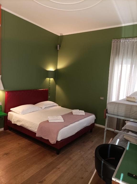 Posteľ alebo postele v izbe v ubytovaní Rooms Via Diaz