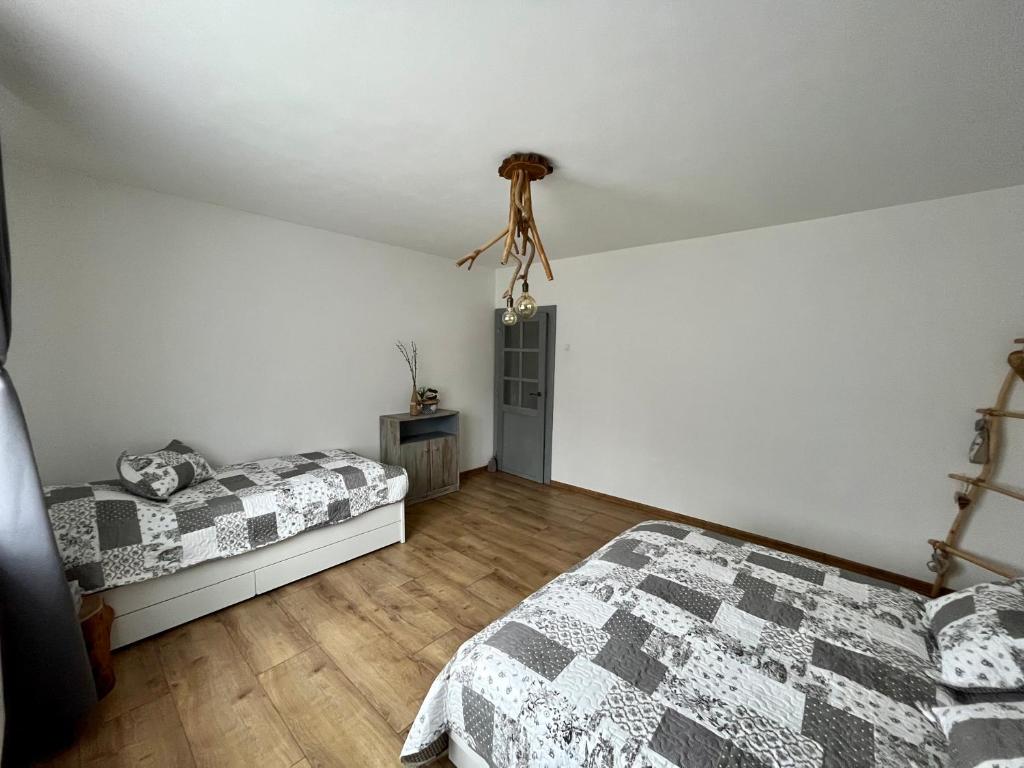Postel nebo postele na pokoji v ubytování Apartmánový dom Adas