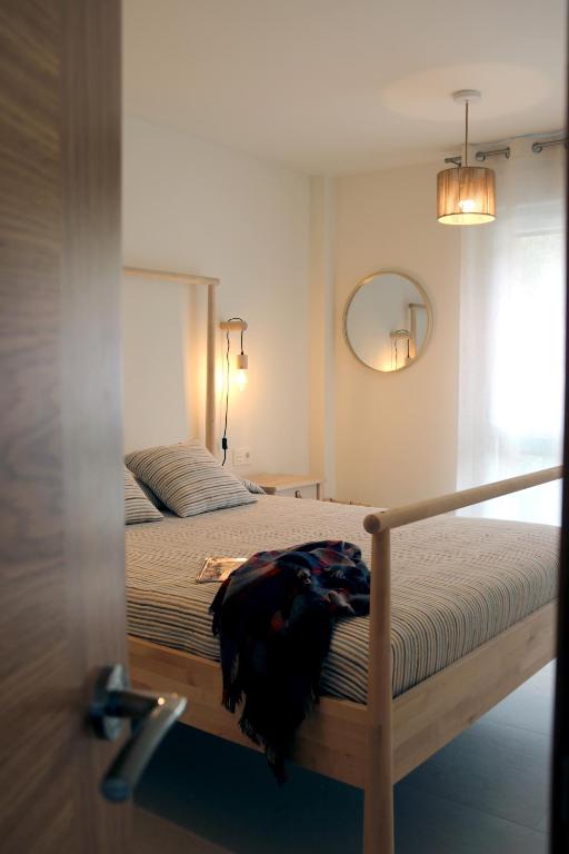 Postel nebo postele na pokoji v ubytování Casa Anida en Hualle
