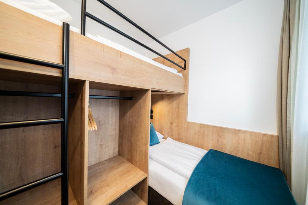 Postel nebo postele na pokoji v ubytování Hotel Trattnig
