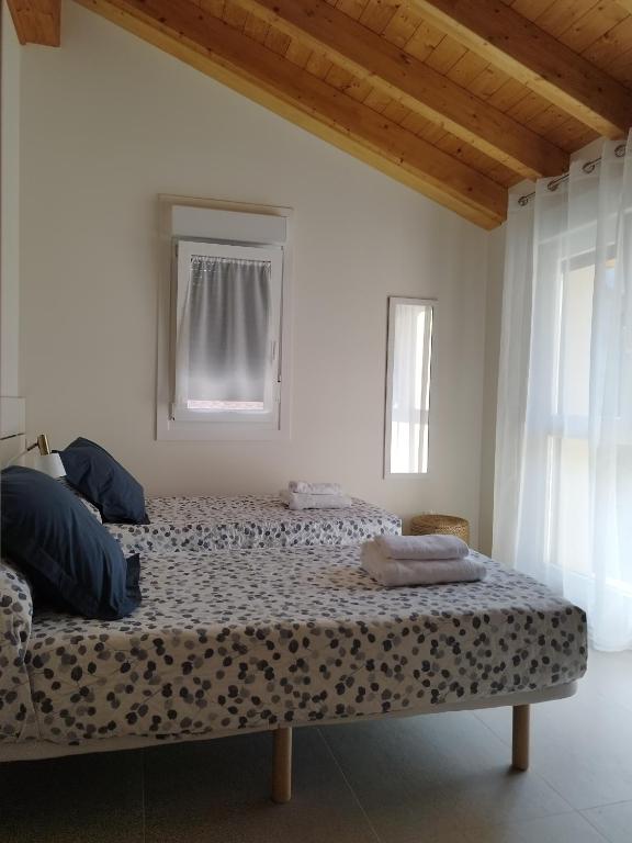 Postel nebo postele na pokoji v ubytování Casa Anida en Hualle
