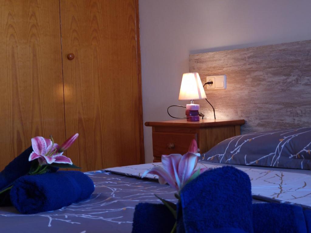 Posteľ alebo postele v izbe v ubytovaní Riumar "Eva", 300m to beach, private pool, On-Site-Service, dog beach