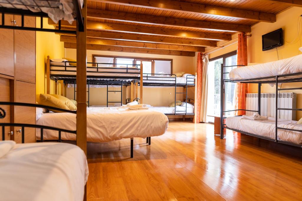 Postel nebo postele na pokoji v ubytování Hotel Golf Natura