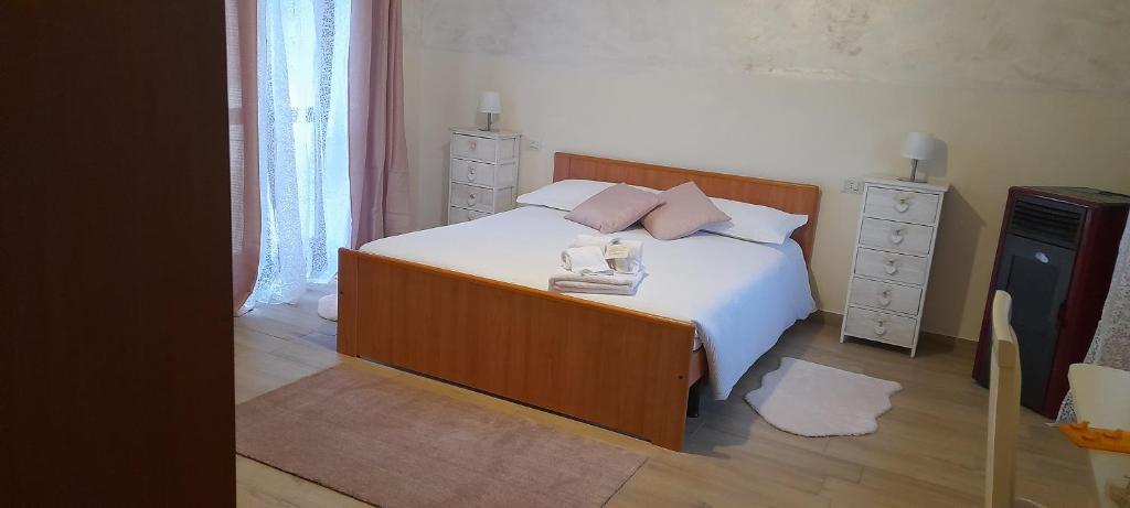 Postel nebo postele na pokoji v ubytování CASA CASEROTTE