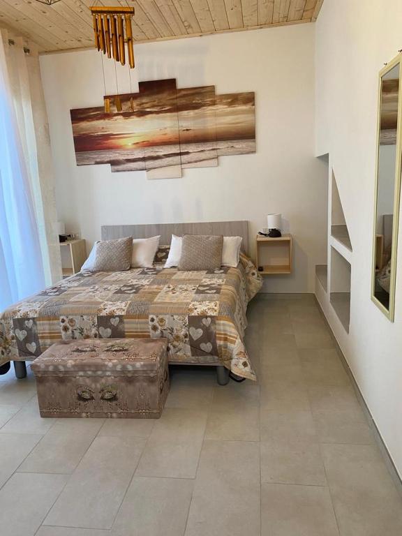 A bed or beds in a room at Monolocale V.M 0.23