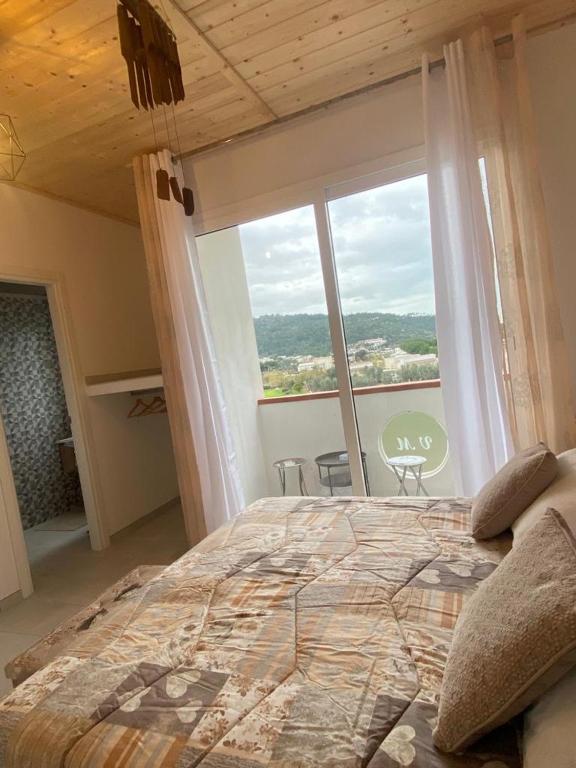 A bed or beds in a room at Monolocale V.M 0.23