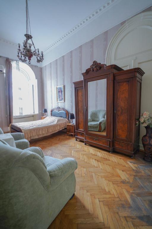 Llit o llits en una habitació de Leon Rooms