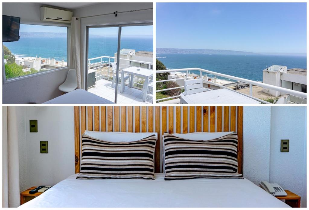 a bedroom with a bed and a balcony with the ocean at Dei Templi Apart Hotel in Viña del Mar