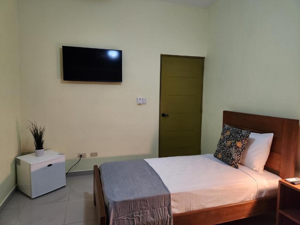 Postel nebo postele na pokoji v ubytování Hotel La Casona MC