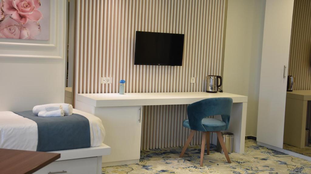 TV a/nebo společenská místnost v ubytování Apartments Jordan Luxury - Gevgelija