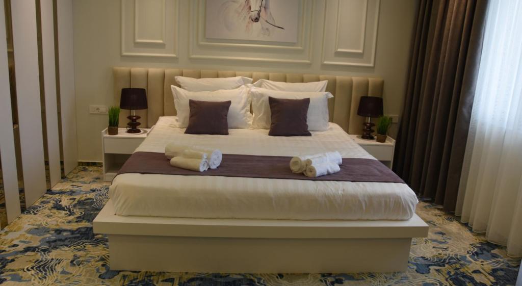 Postel nebo postele na pokoji v ubytování Apartments Jordan Luxury - Gevgelija