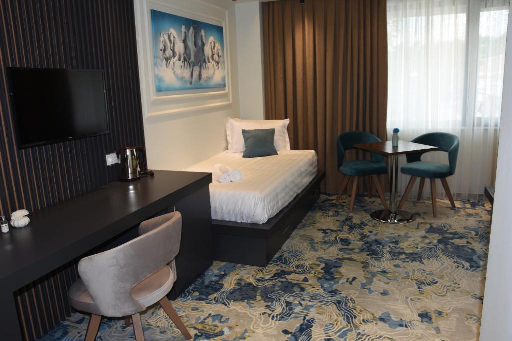 Postel nebo postele na pokoji v ubytování Apartments Jordan Luxury - Gevgelija