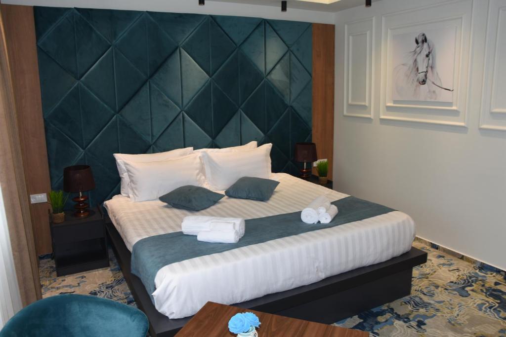 Postel nebo postele na pokoji v ubytování Apartments Jordan Luxury - Gevgelija
