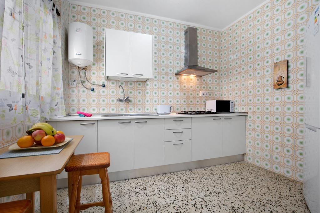 A kitchen or kitchenette at Casa Mela