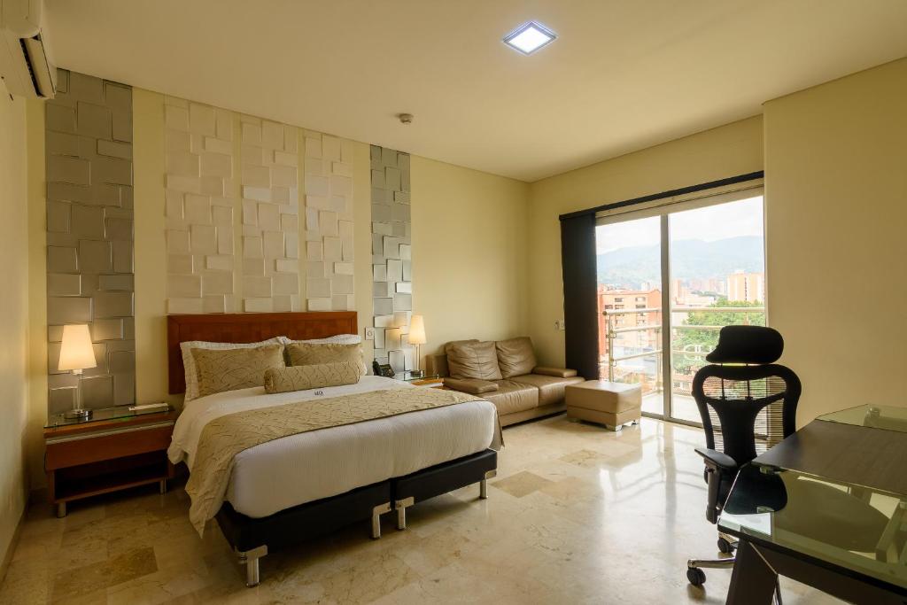 Postel nebo postele na pokoji v ubytování Hotel Dorado La 70