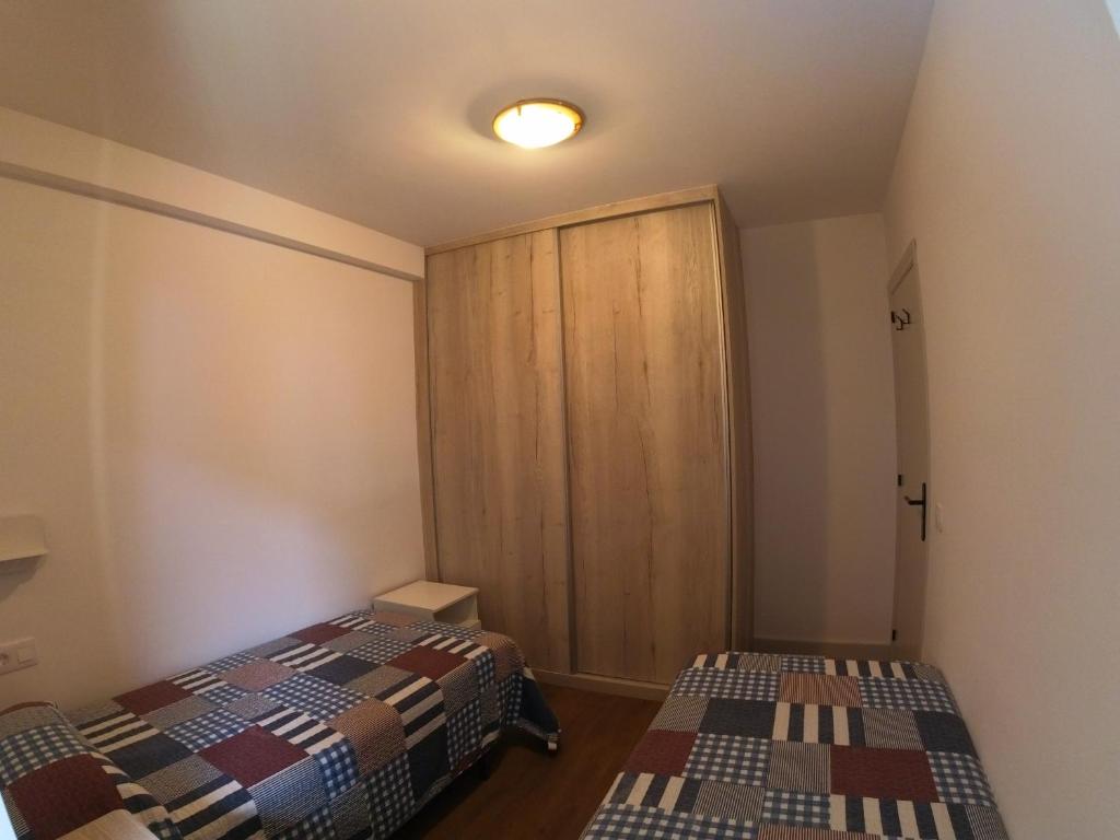 Postel nebo postele na pokoji v ubytování Soldeu Paradis Solneu