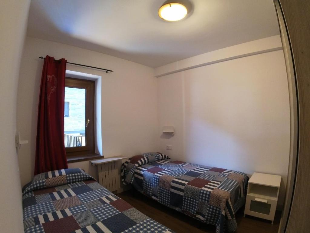 Postel nebo postele na pokoji v ubytování Soldeu Paradis Solneu