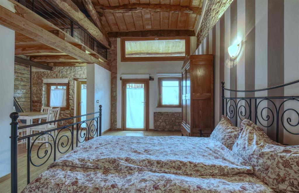 A bed or beds in a room at Romantic Boutique Hospitality