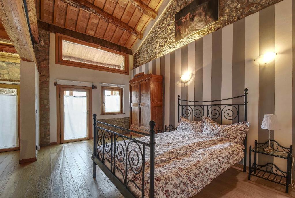 A bed or beds in a room at Romantic Boutique Hospitality