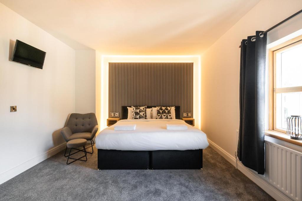 Ένα ή περισσότερα κρεβάτια σε δωμάτιο στο Mabel's Maison by Escape Ordinary