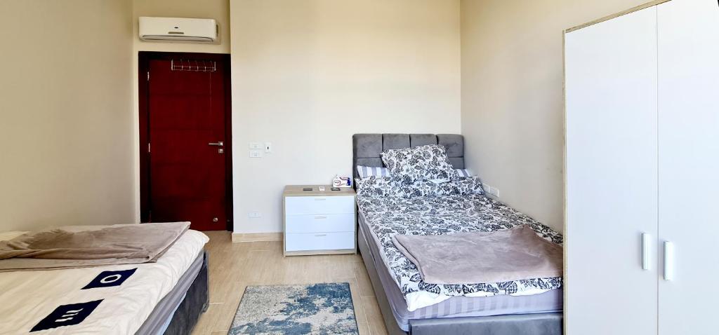 Postel nebo postele na pokoji v ubytování Ain Sokhna 'Cosmopolitan'- Half-Board