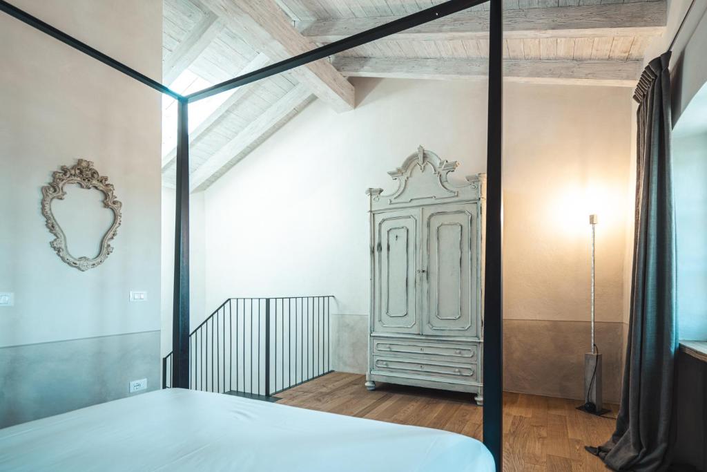 Postel nebo postele na pokoji v ubytování Borgo dei Gatti Albergo Diffuso & spa