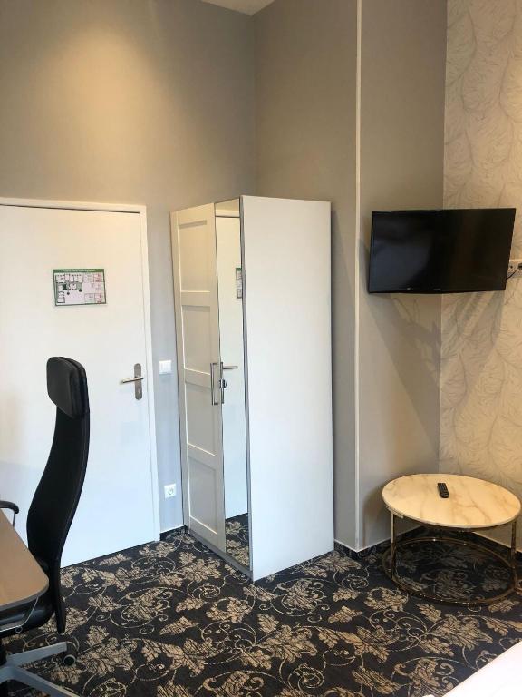 TV a/nebo společenská místnost v ubytování Hotel Gasteiner Hof