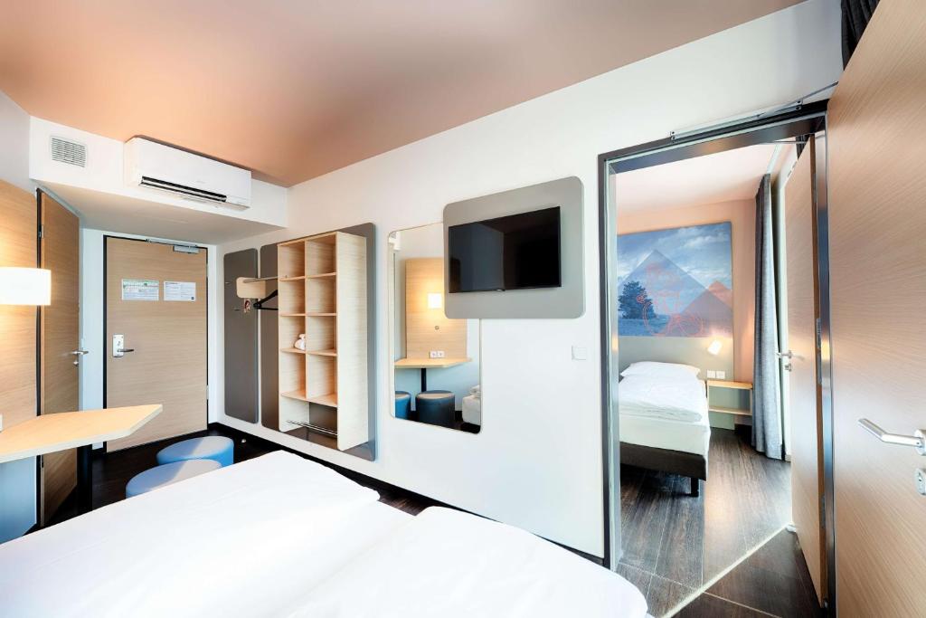 Postel nebo postele na pokoji v ubytování B&B Hotel Willingen