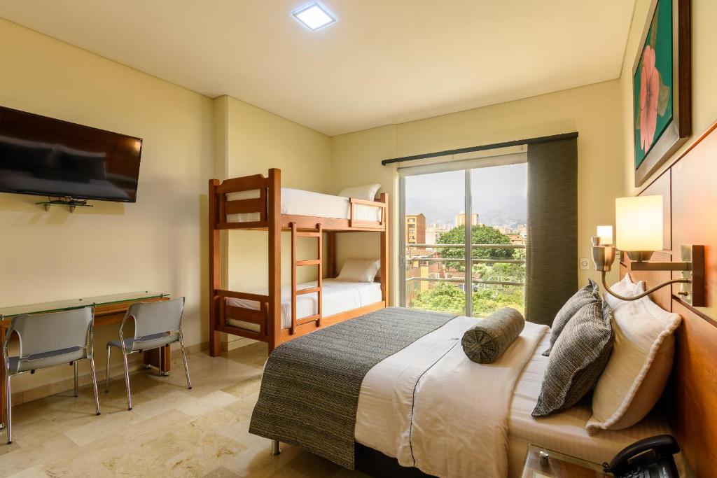 Postel nebo postele na pokoji v ubytování Hotel Dorado La 70