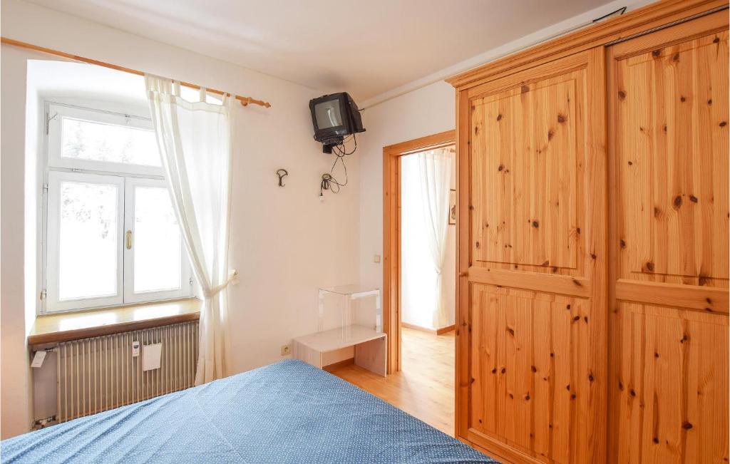 Postel nebo postele na pokoji v ubytování Amazing Apartment In Località Carbonin