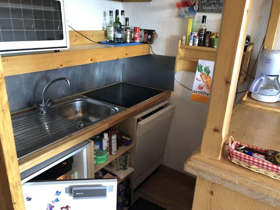 Kuchyňa alebo kuchynka v ubytovaní Appartement La Marmotte, Arc 2000