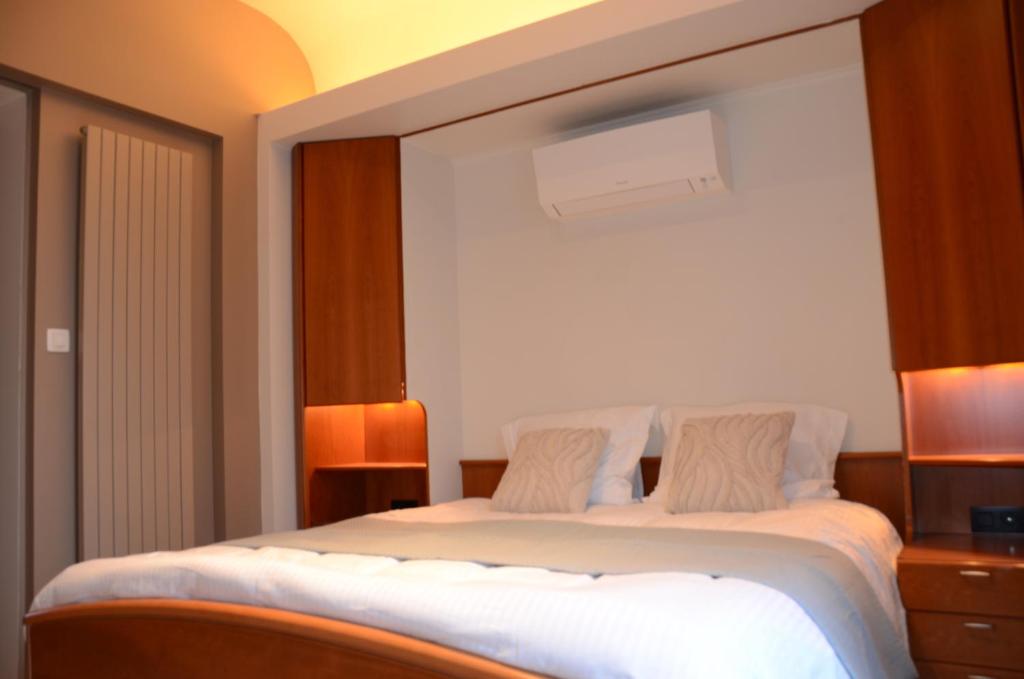 Postel nebo postele na pokoji v ubytování Boeckhaege vakantiewoning